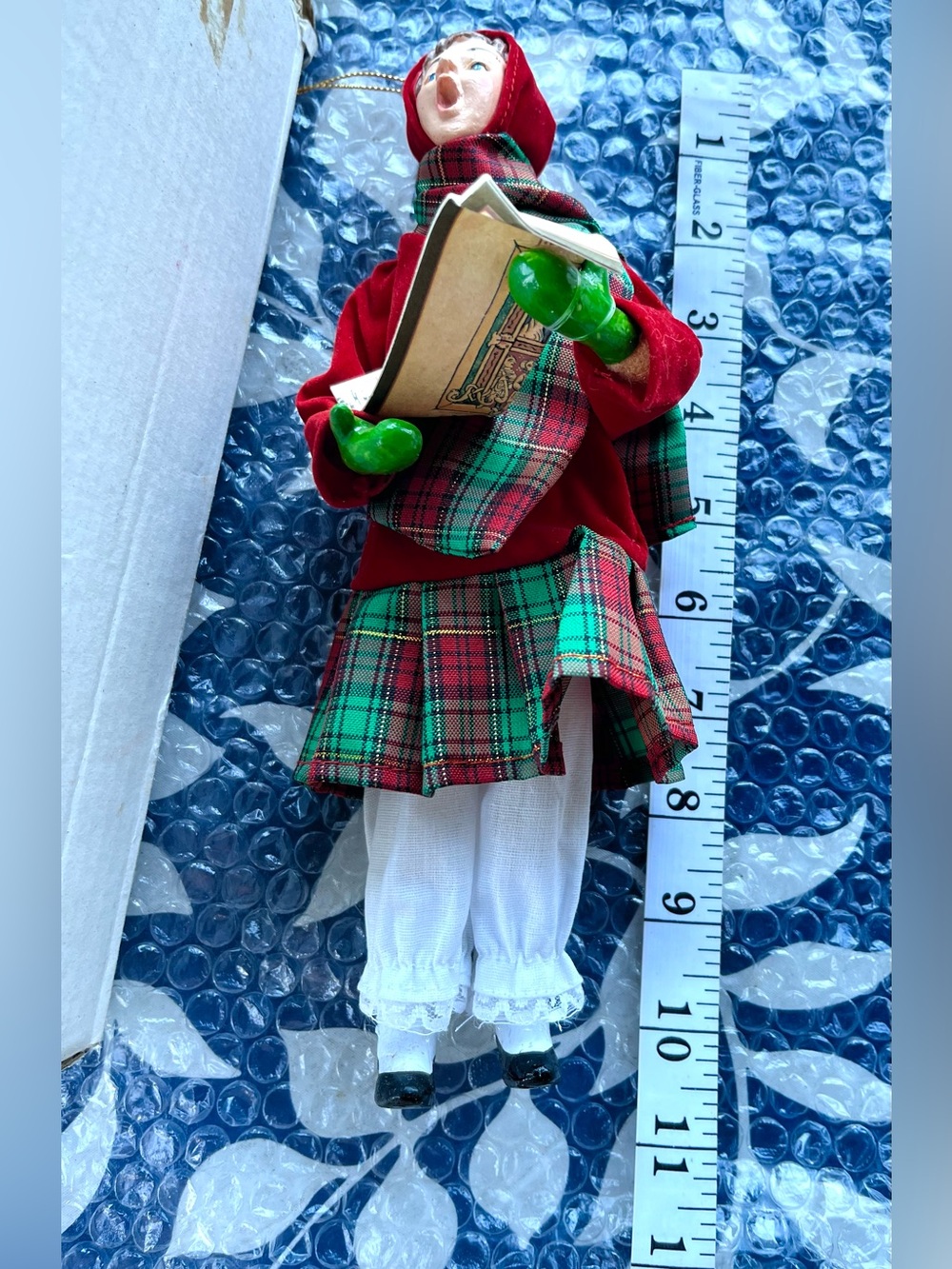 Vintage Christmas caroler doll, singing figure in red hooded cape original box